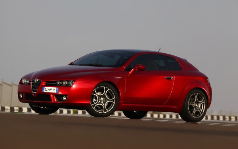 red alfa romeo coupe on track