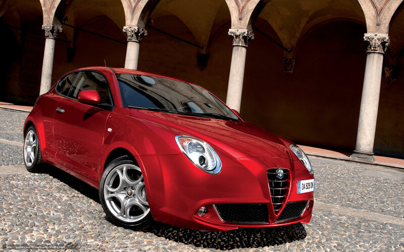 Red Alfa Romeo in courtyard