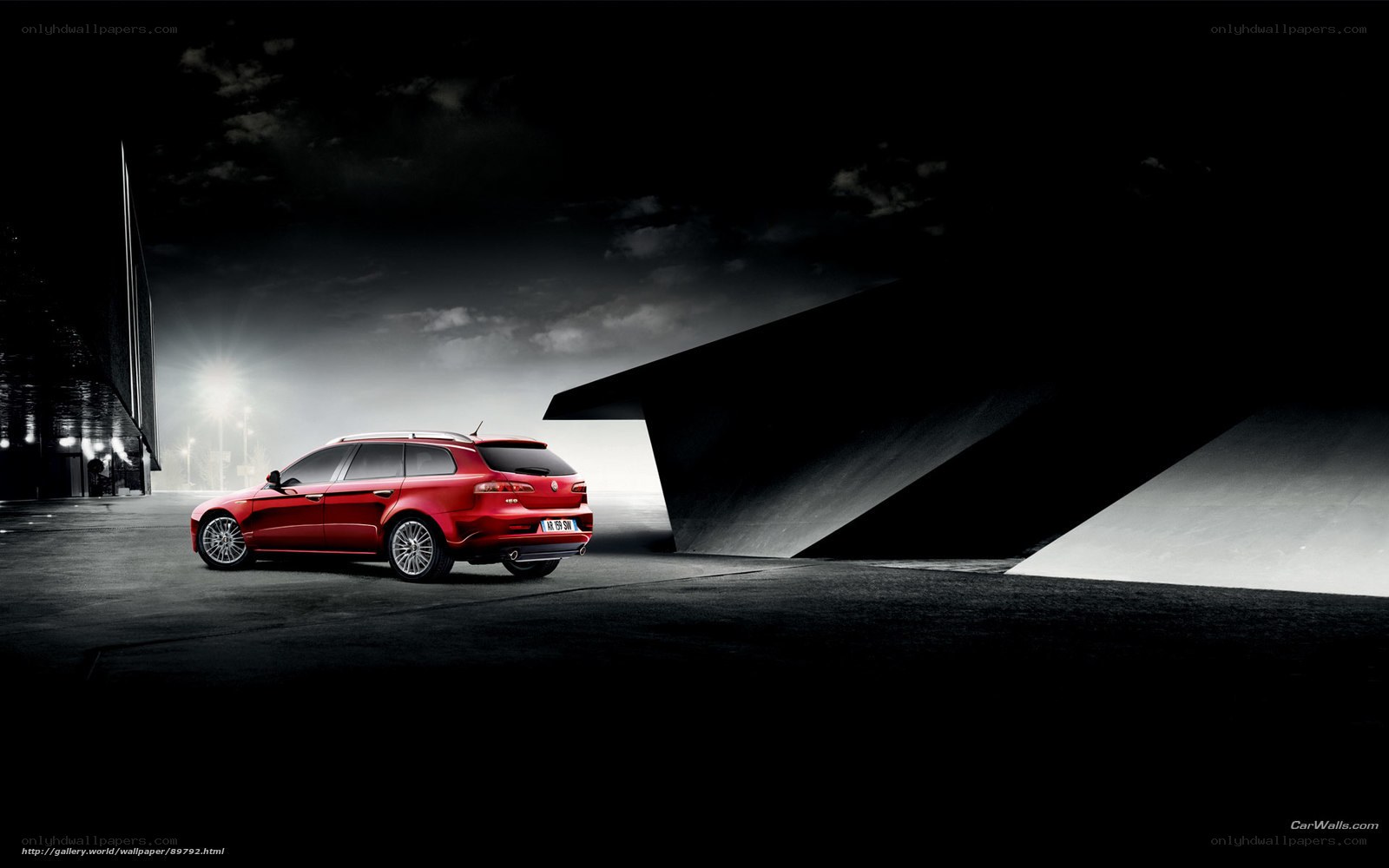 Red Alfa Romeo in dark setting