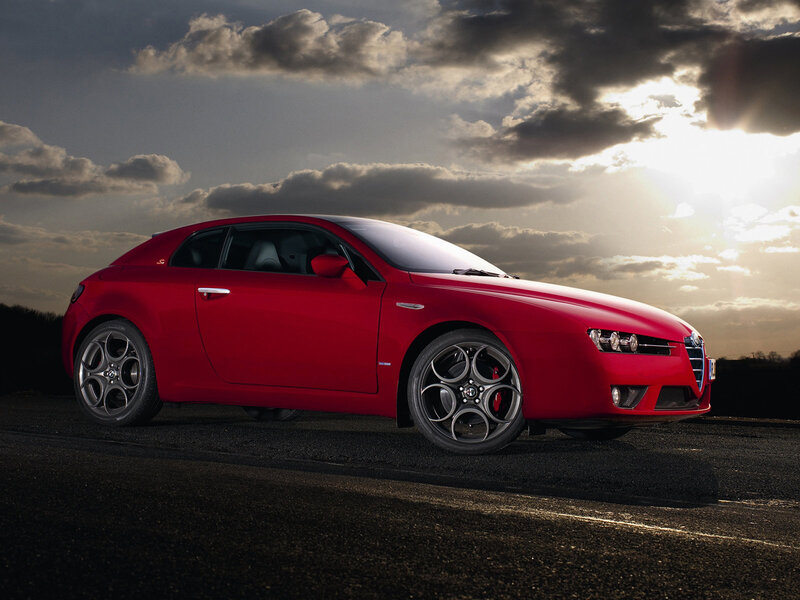 Red Alfa Romeo in dramatic lighting