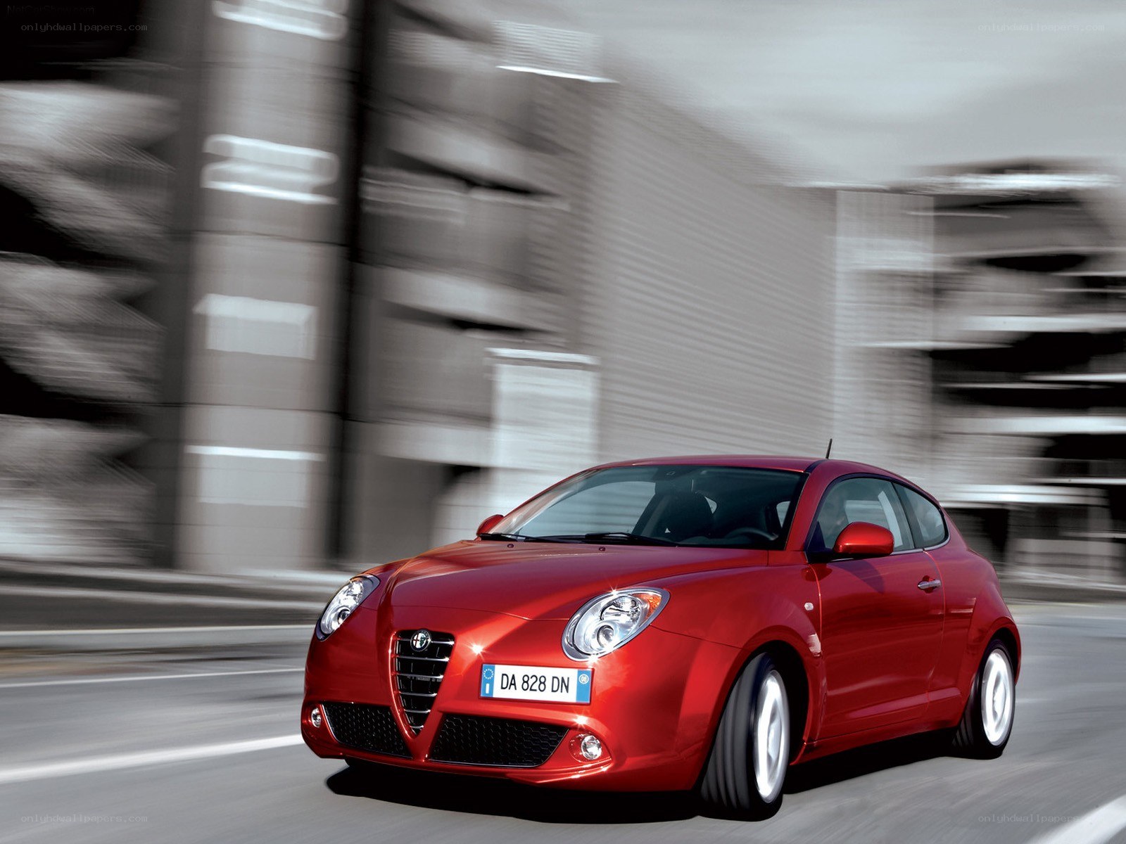 red alfa romeo in motion