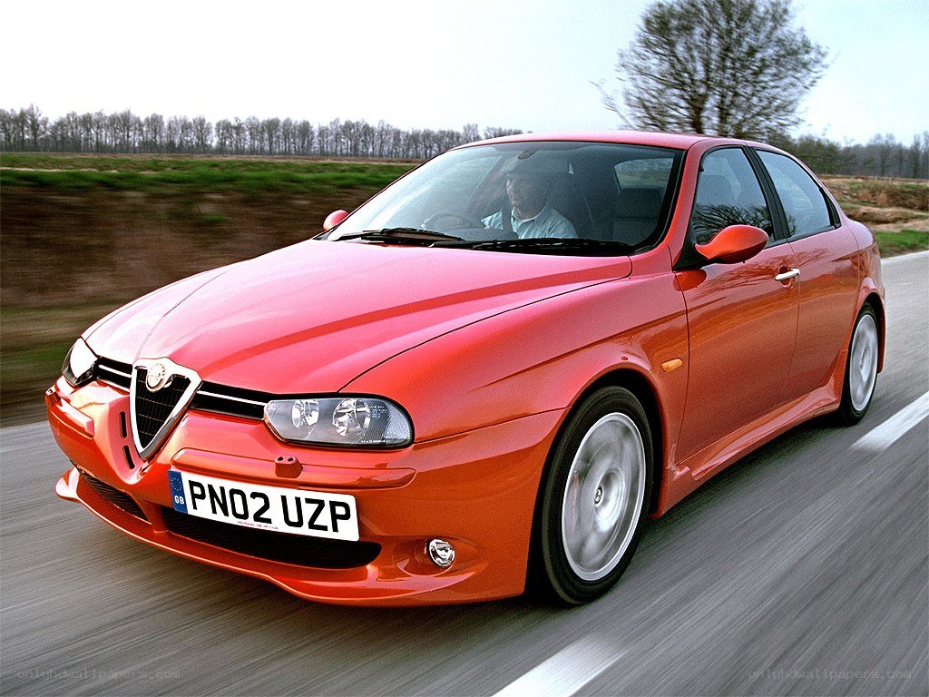 red alfa romeo in motion