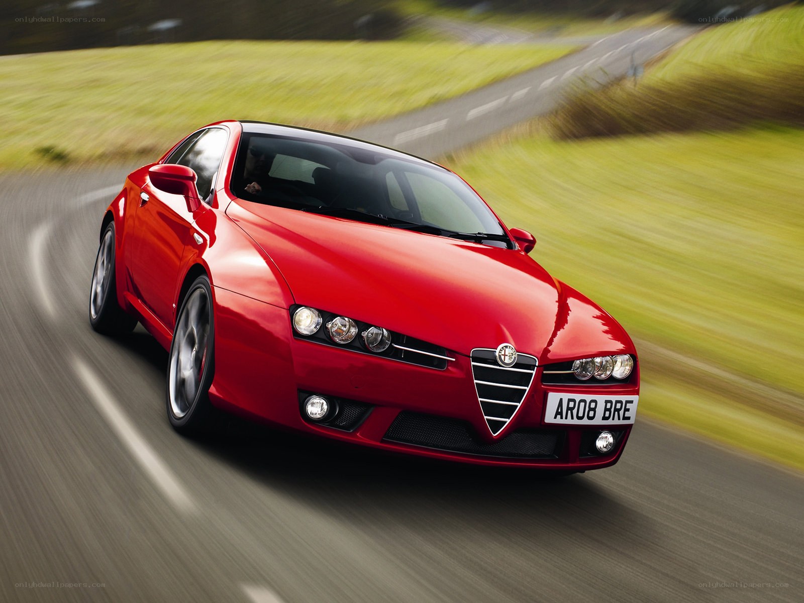 Red Alfa Romeo in motion