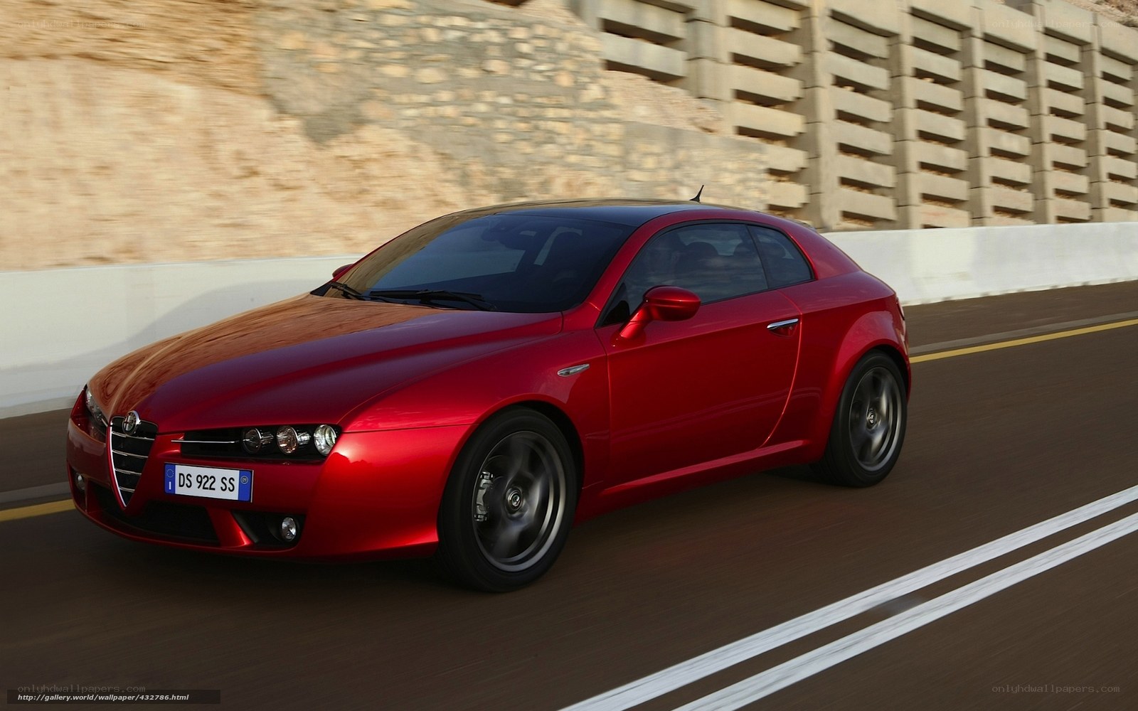 red alfa romeo in motion