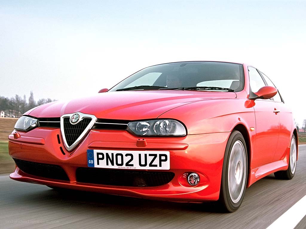 red alfa romeo in motion