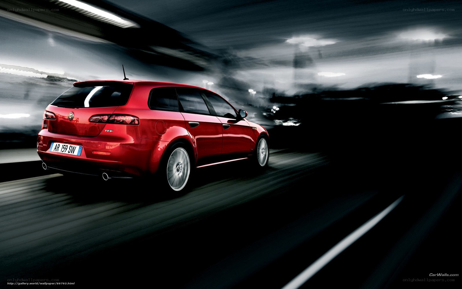 Red Alfa Romeo in motion