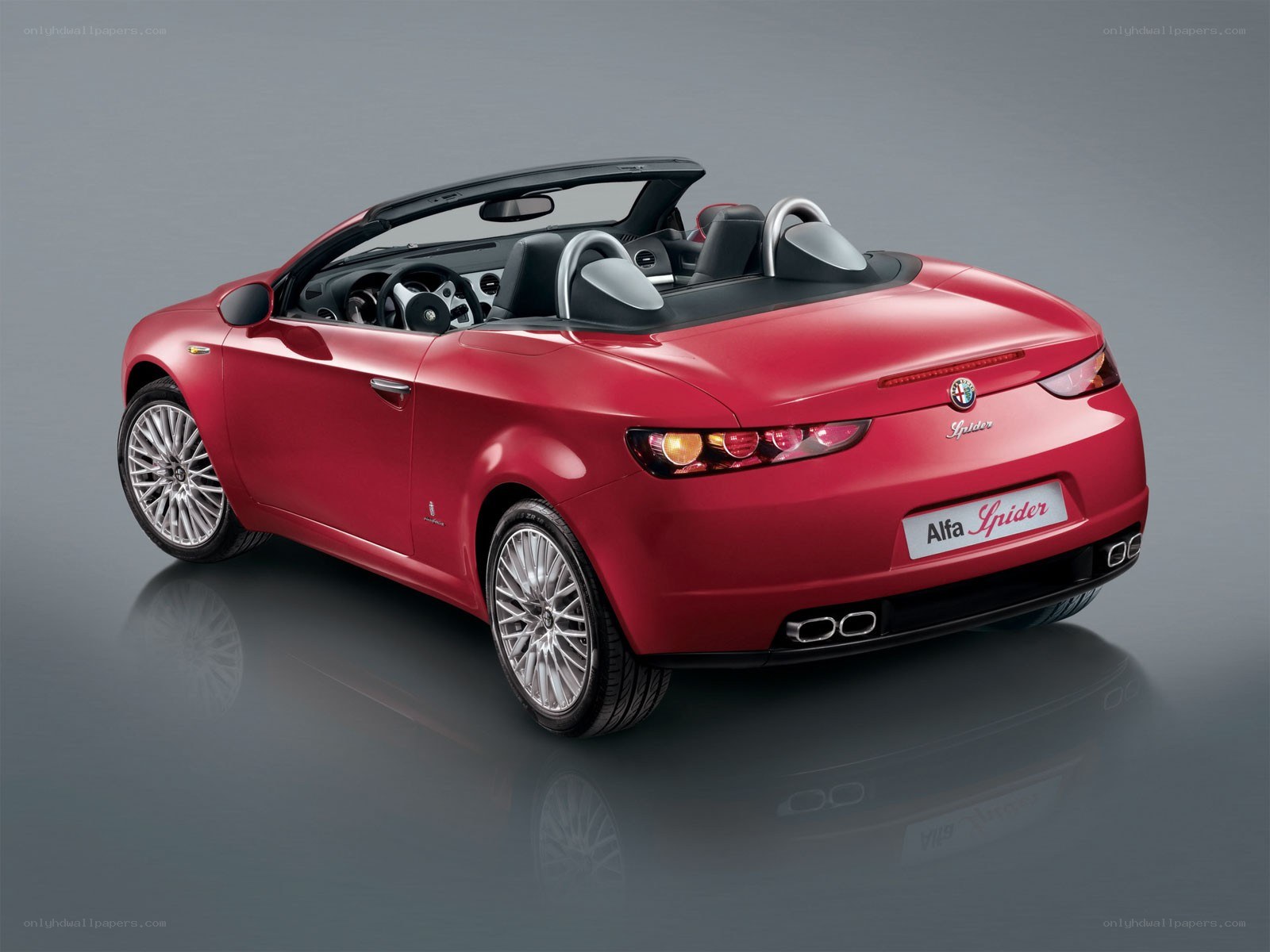 Red Alfa Romeo Spider convertible