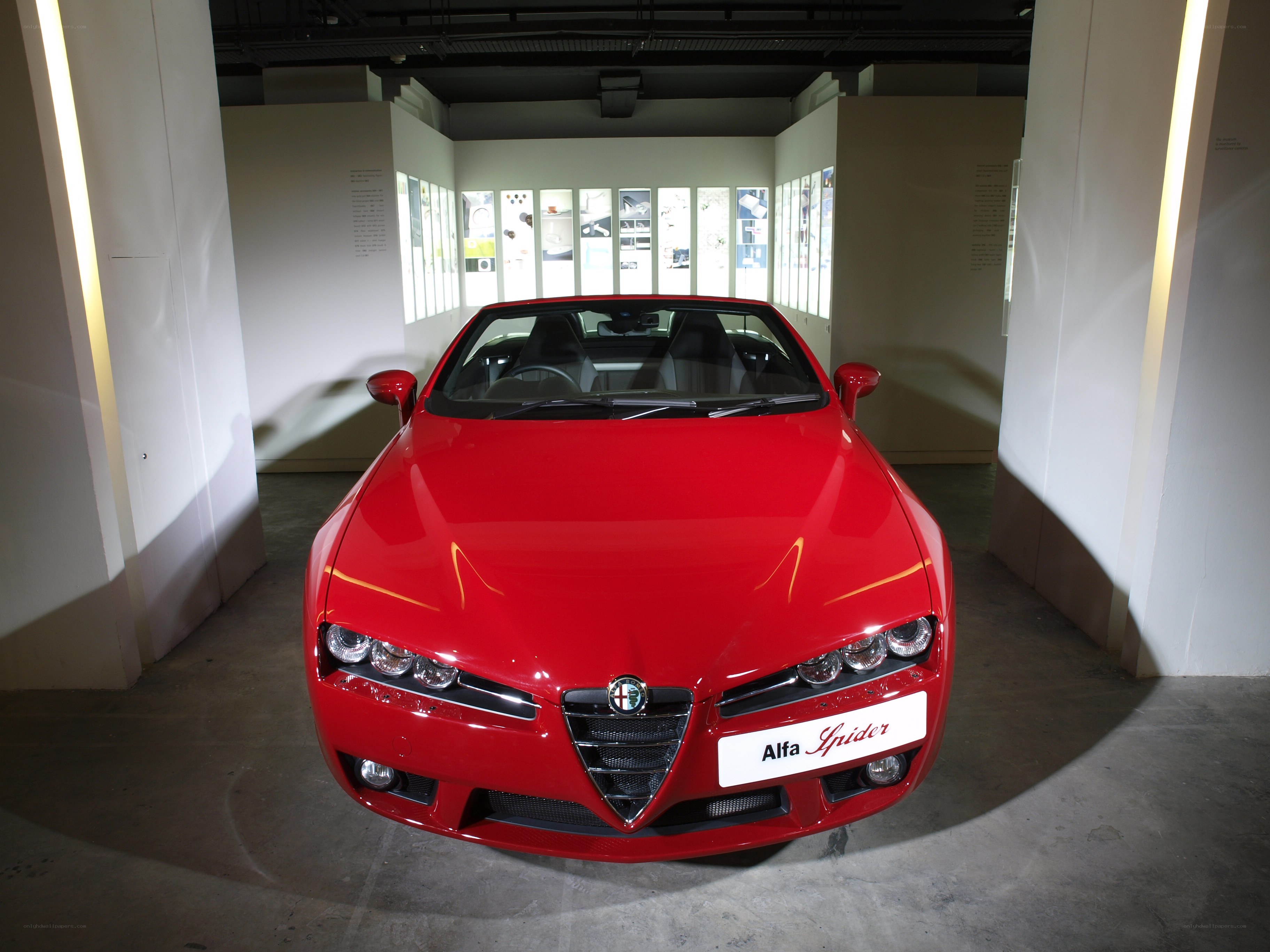 Red Alfa Romeo Spider on display