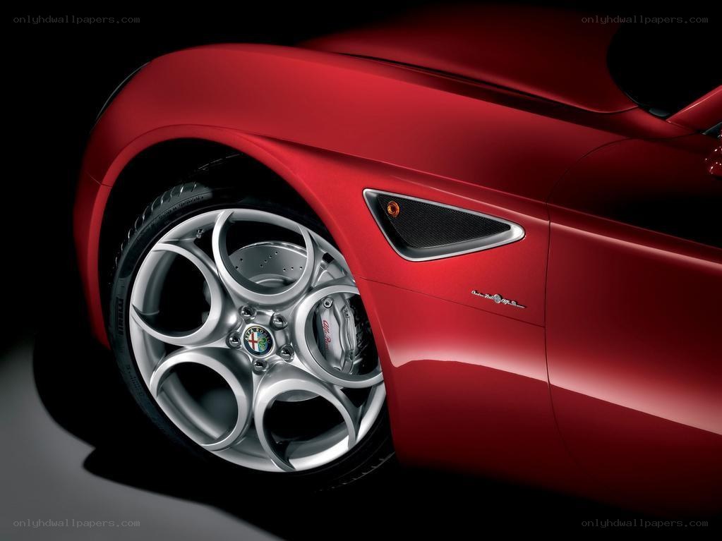 Red Alfa Romeo wheel close-up
