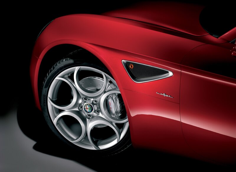 Red Alfa Romeo wheel close-up