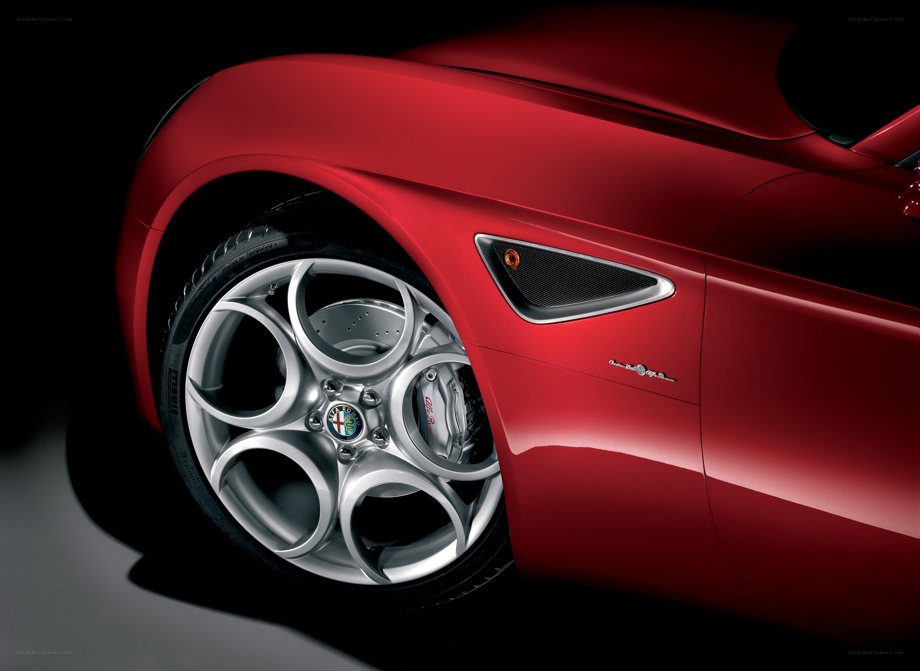 Red Alfa Romeo wheel close-up