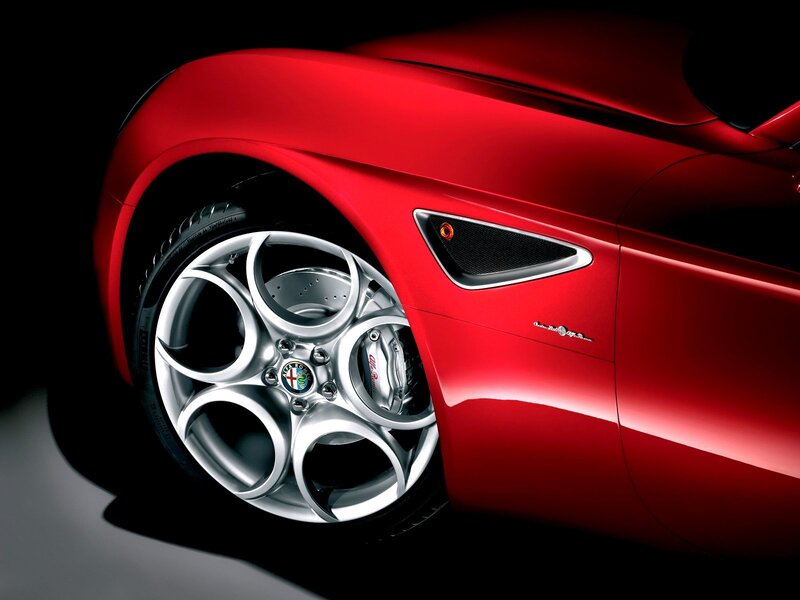 Red Alfa Romeo Wheel — Dramatic, Photograph, Car