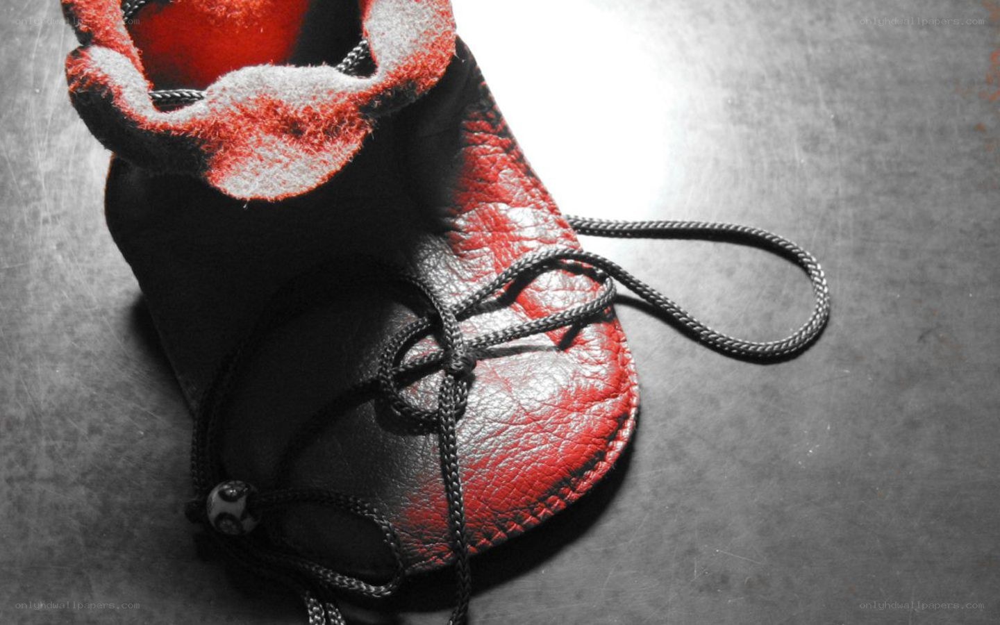 red and black boot
