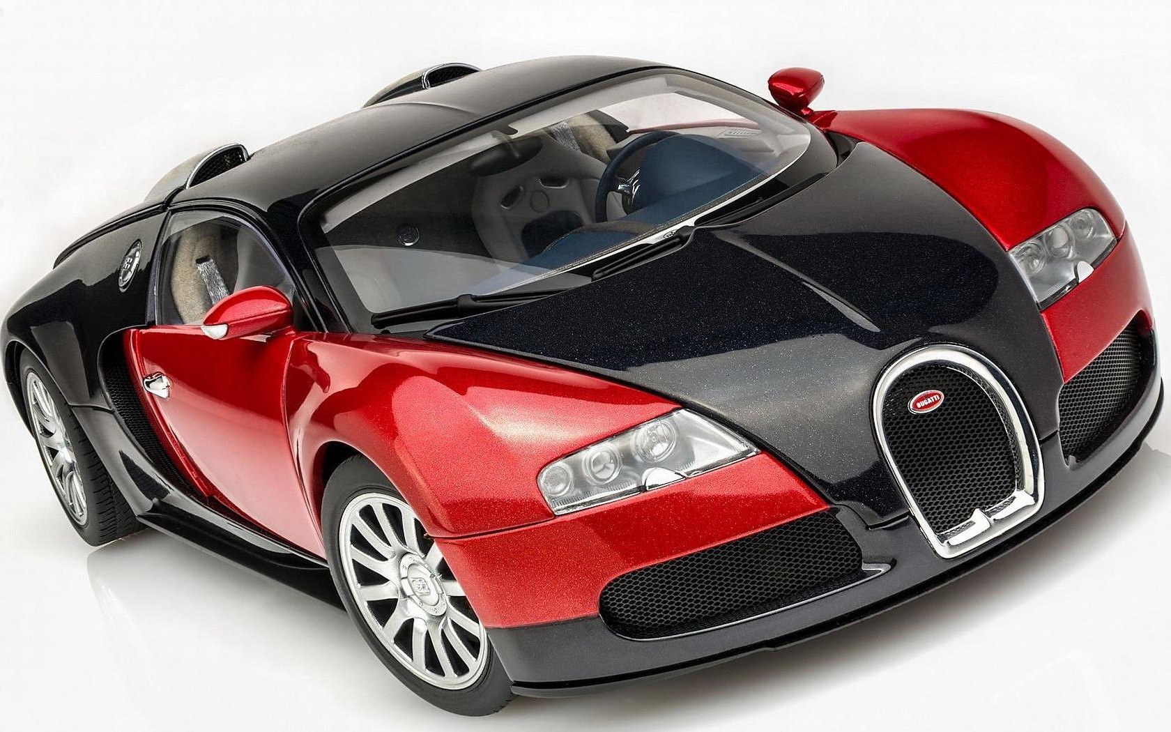Red and black Bugatti Veyron