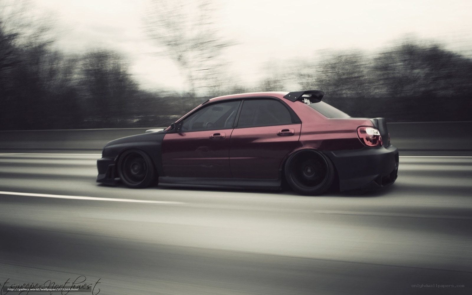 red and black car in motion