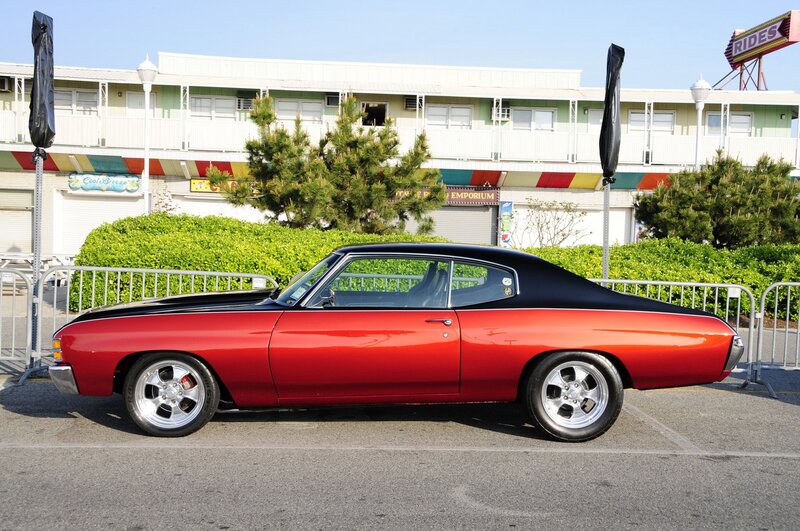 Red and Black Classic Car — Calm, Afternoon, Photograph, Building