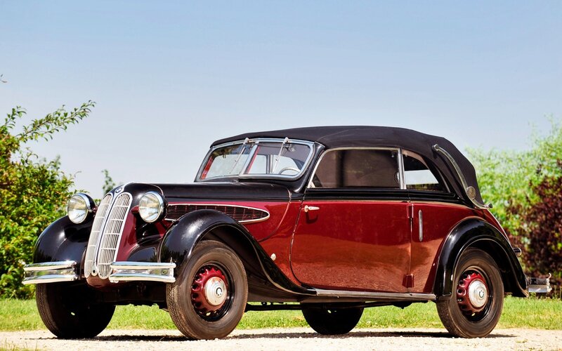 Red and Black Convertible Car — Serene