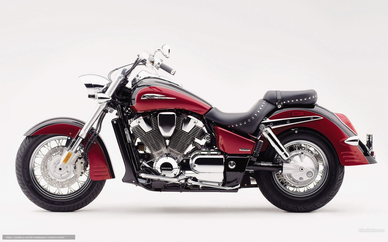 red and black cruiser motorcycle