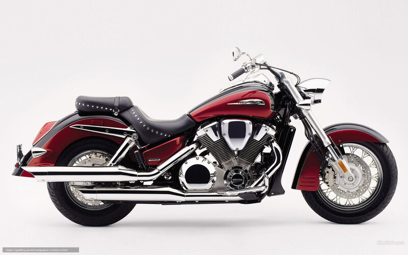red and black cruiser motorcycle