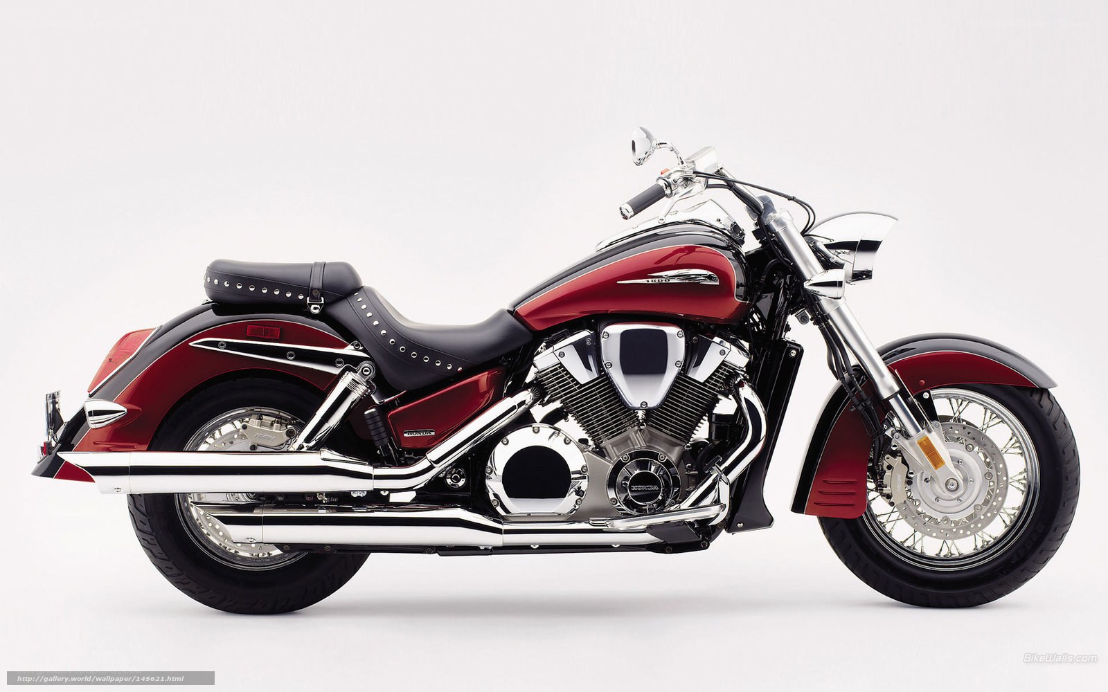red and black cruiser motorcycle