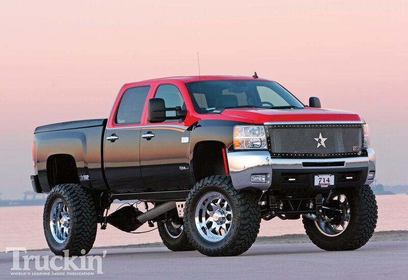 Red and Black Lifted Truck — Dramatic