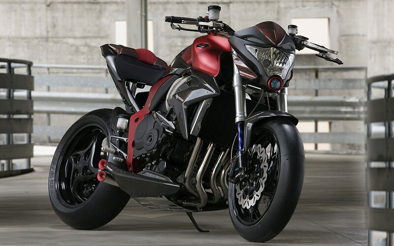 Red and Black Motorcycle — Dramatic, Photograph, Concrete Wall