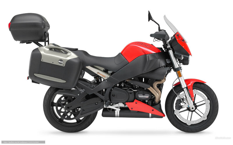red and black motorcycle with luggage