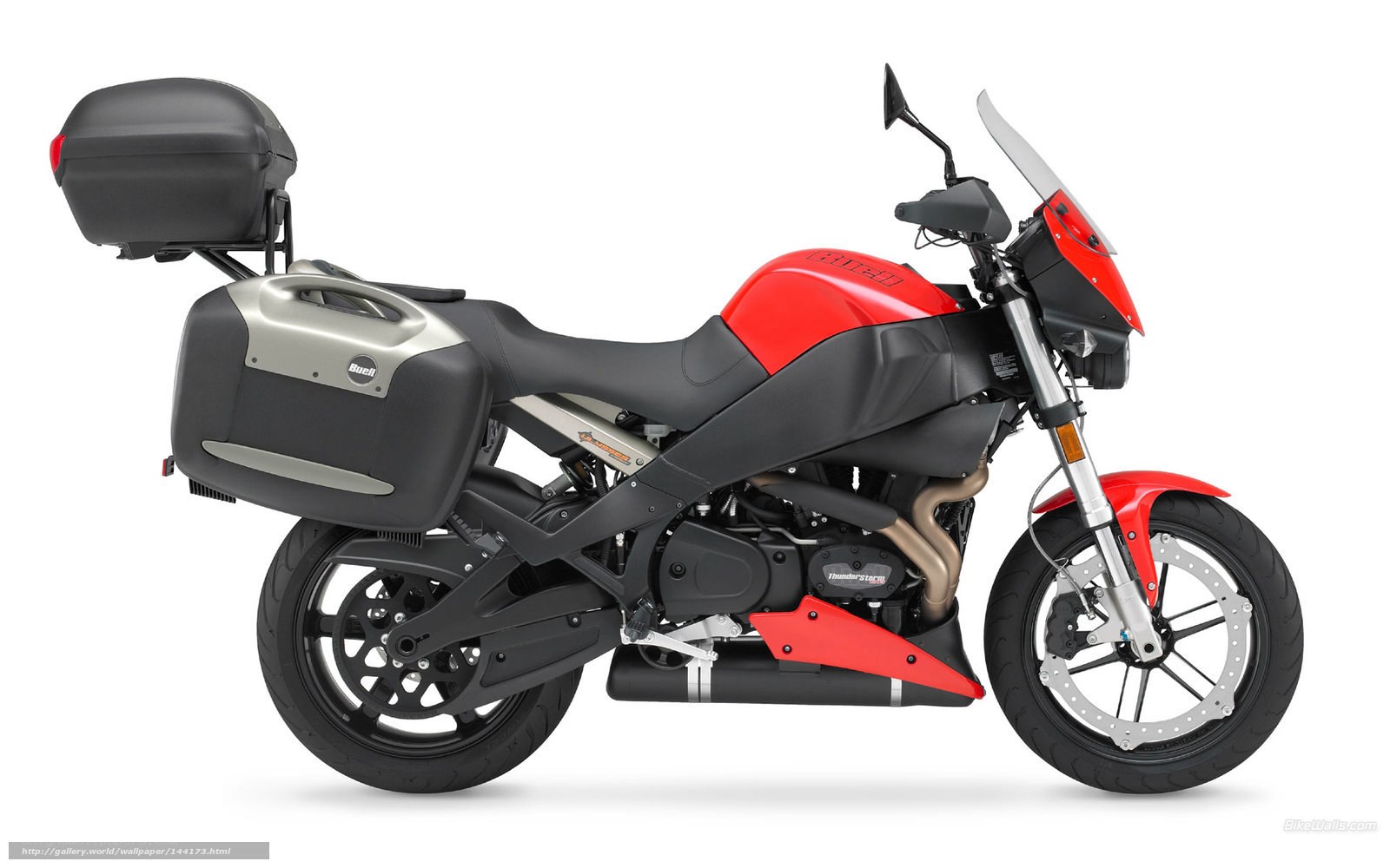 red and black motorcycle with luggage
