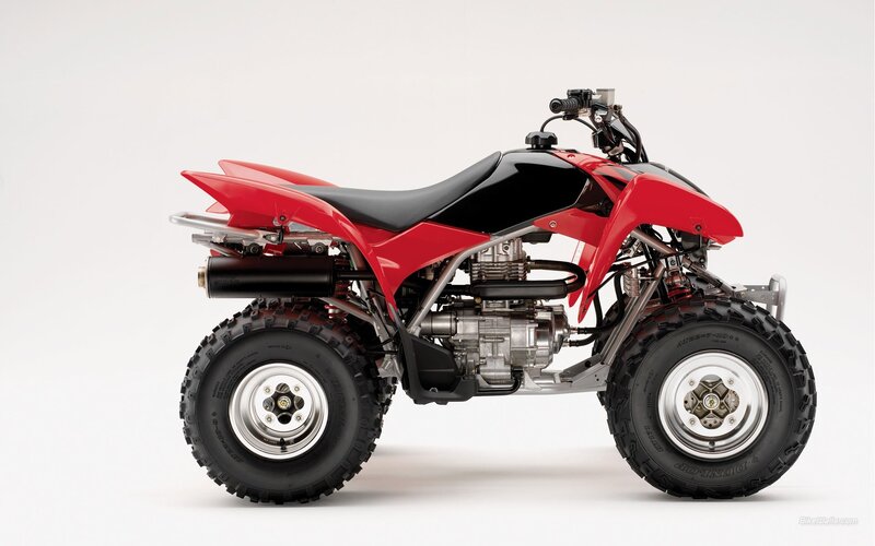 red and black quad bike