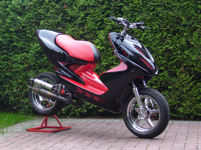 Red and Black Scooter — Calm