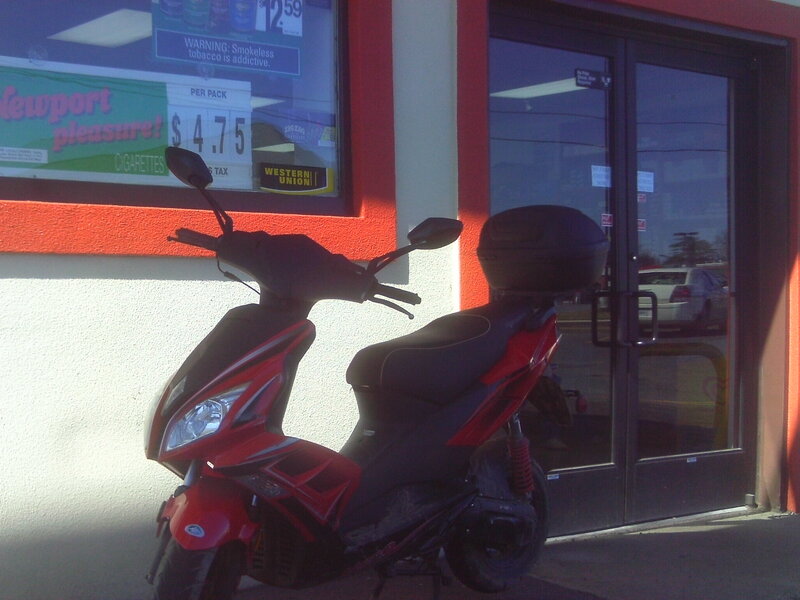 Red and Black Scooter — Neutral