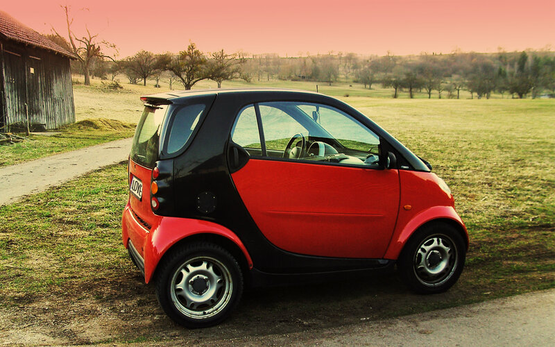 Red and Black Smart Car — Serene