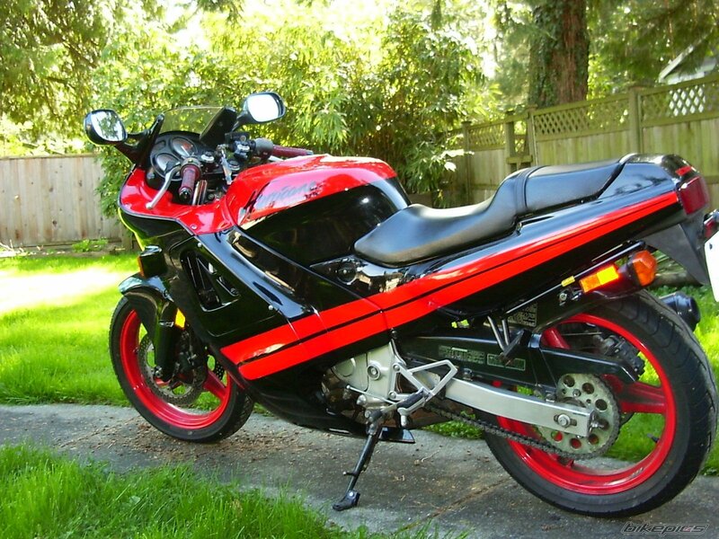 red and black sport motorcycle