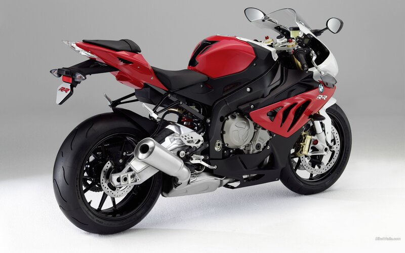 red and black sport motorcycle