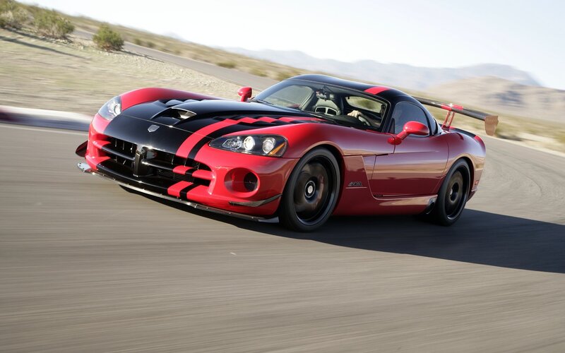 Red and Black Sports Car — Dynamic, Afternoon, Photograph, Race Track, Mountains, Driver