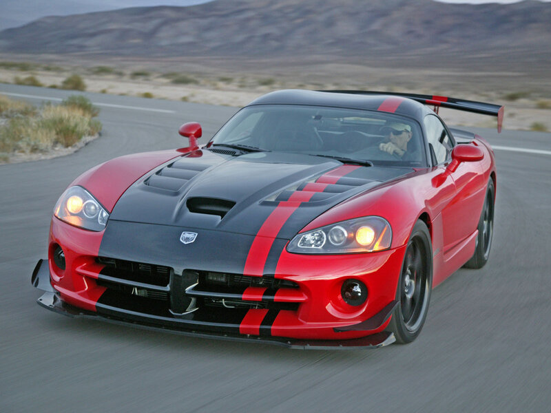 Red and Black Sports Car — Mountains