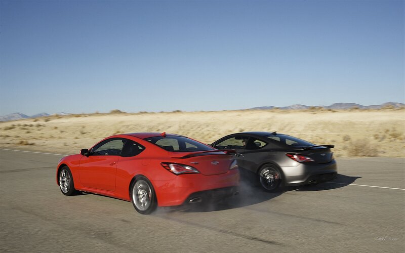 Red and black sports cars racing