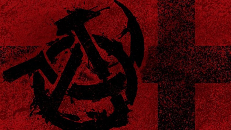 Red and black symbol on textured background
