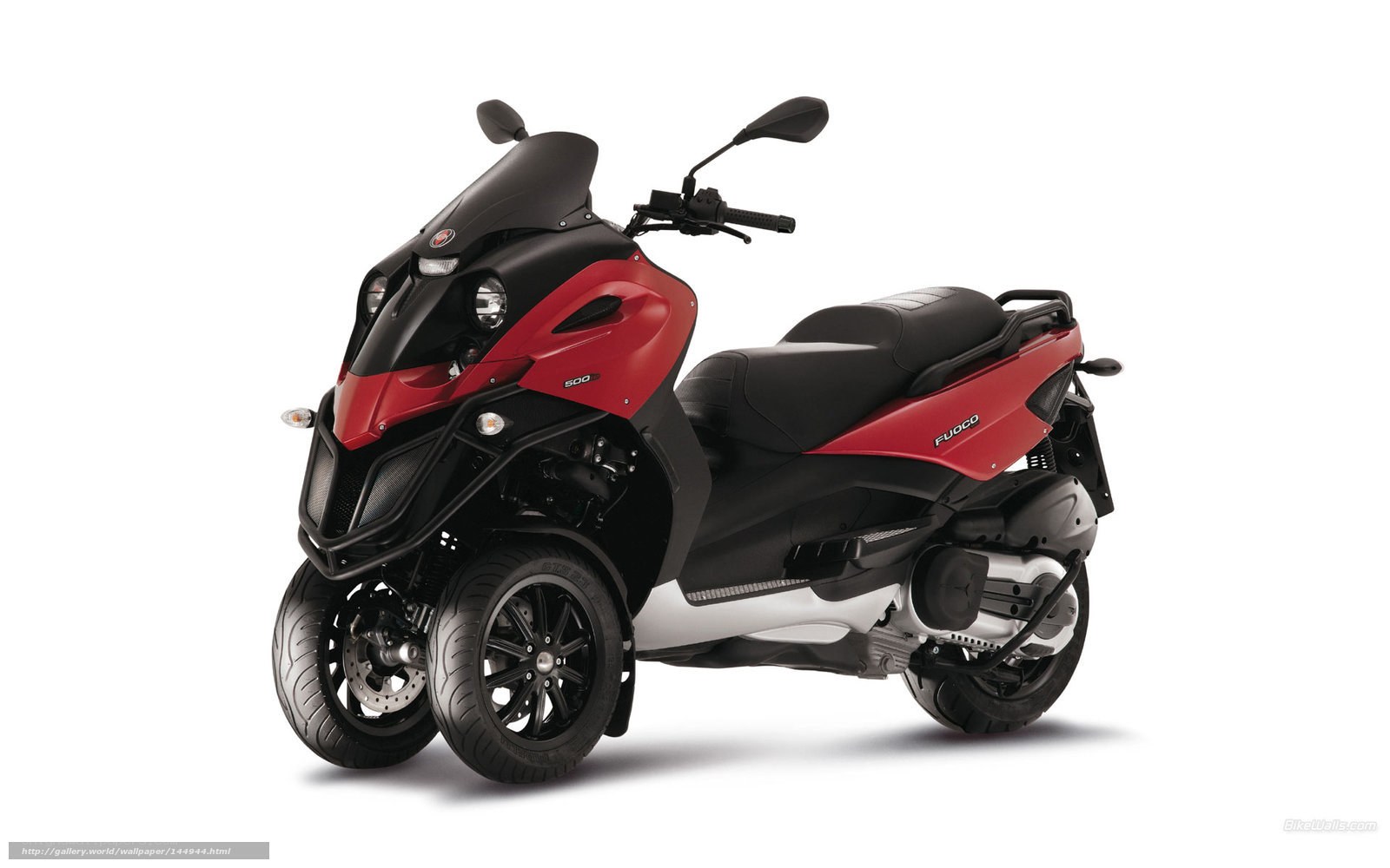 red and black three-wheeled scooter
