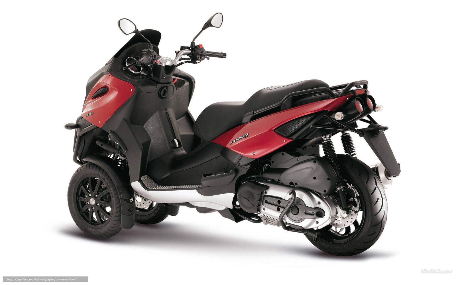 red and black three-wheeled scooter
