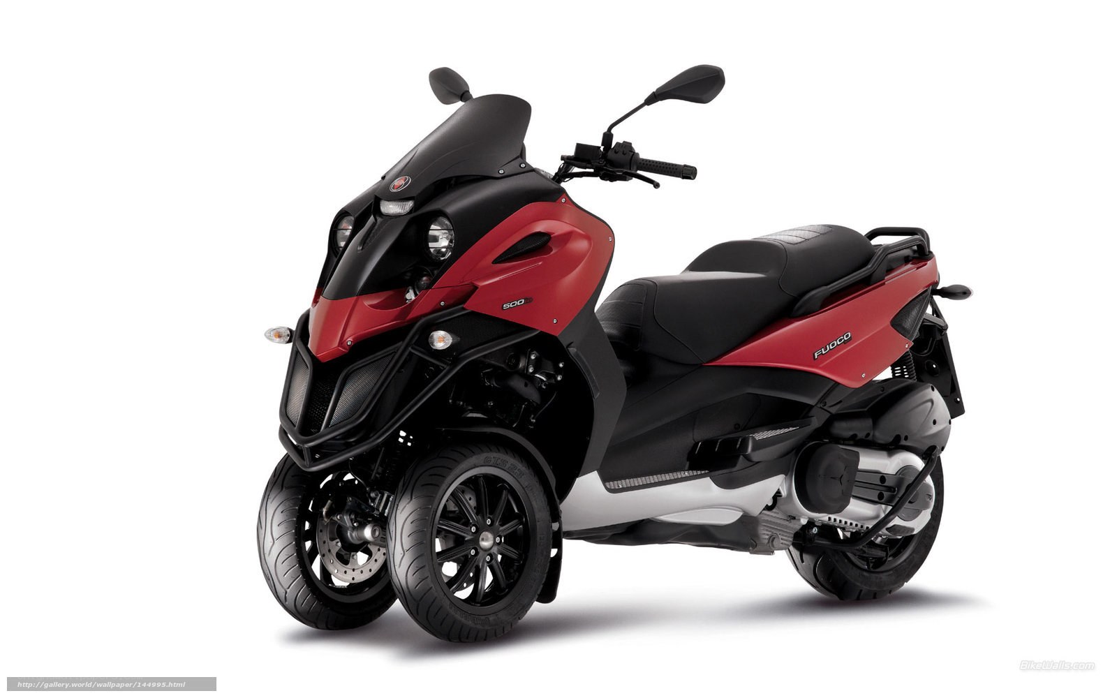 red and black three-wheeled scooter