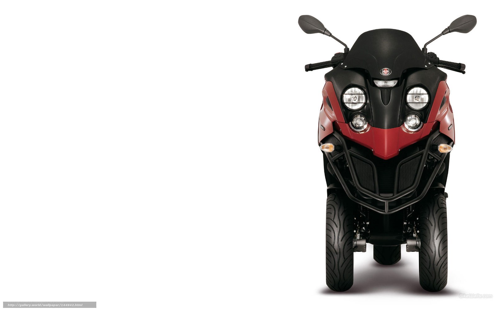 red and black three-wheeled scooter