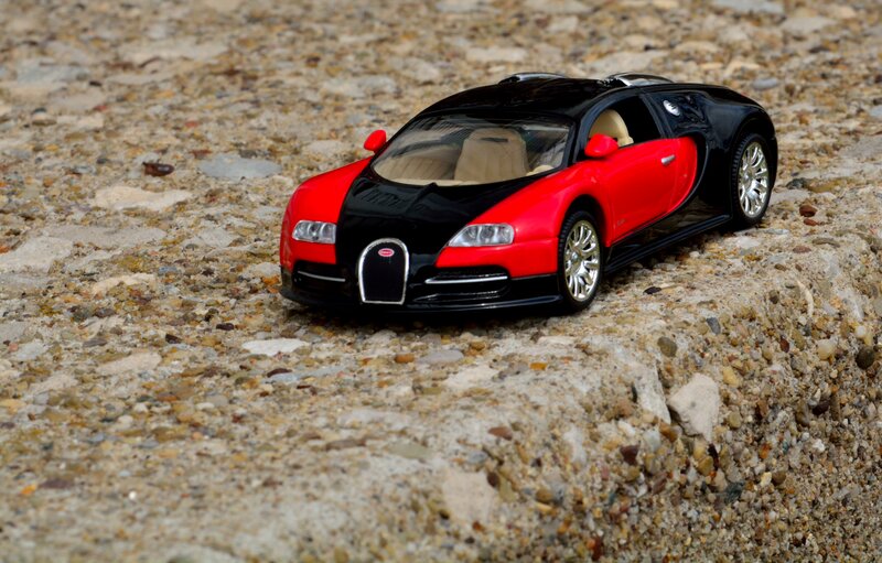 Red and Black Toy Car — Calm