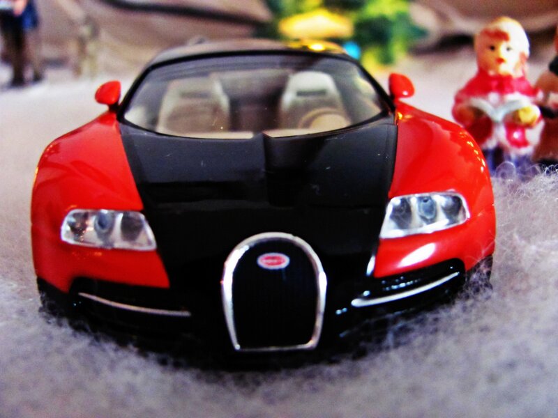 Red and Black Toy Car — Festive, Winter, Photograph