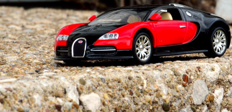 Red and Black Toy Car — Neutral, Photograph, Toy Car