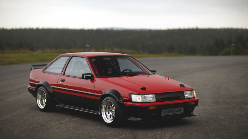 Red and Black Toyota Corolla