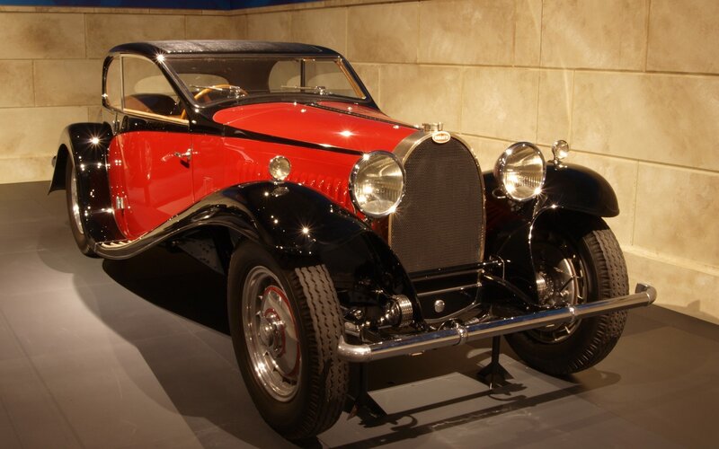 Red and black vintage Bugatti car