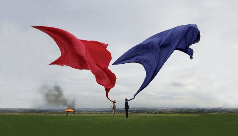 Red and blue fabric in a field