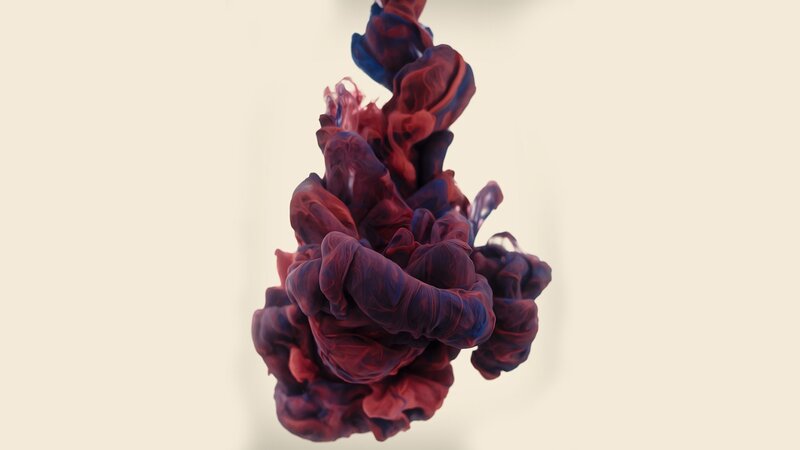 red and blue ink in water