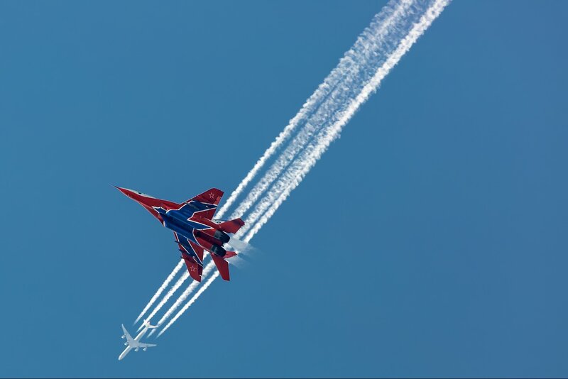 Red and Blue Jet Fighter — Dynamic, Afternoon, Photograph